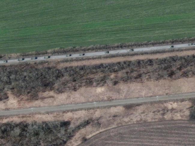 A large military convoy consisting of hundreds of vehicles moving south through the Ukrainian town of Velykyi Burluk. Picture: Maxar Technologies / AFP