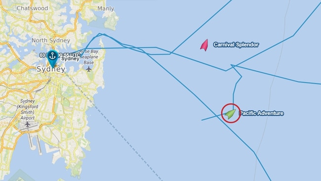 The Pacific Adventure and Carnival Splendor are stopped outside Sydney Heads to search for a person missing from the Pacific Adventure cruise ship.