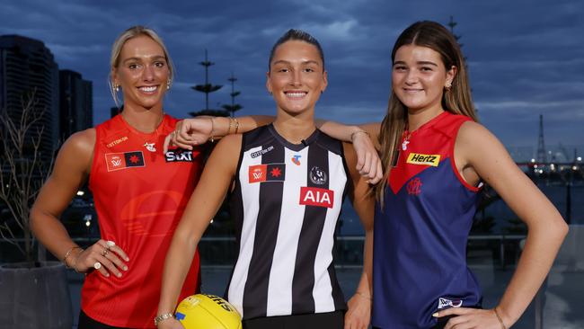 MELBOURNE, AUSTRALIA - DECEMBER 16: Top 3 draft picks Ash Centra of the Magpies (C), Havana Harris of the Suns (L) and Molly O'Hehir of the Demons pose during the 2024 Telstra AFLW Draft at Marvel Stadium on December 16, 2024 in Melbourne, Australia. (Photo by Dylan Burns/AFL Photos via Getty Images)