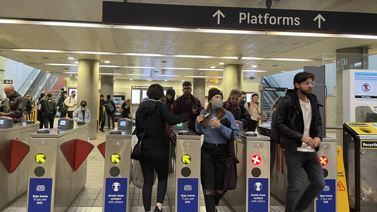 Commuters file through the Parramatta turnstiles.