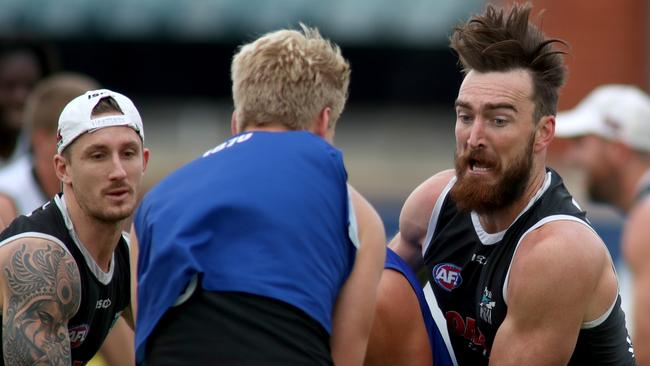 Vice-captain Hamish Hartlett, left, and Charlie Dixon at Alberton Oval on Tuesday. Picture: AAP Image/Kelly Barnes