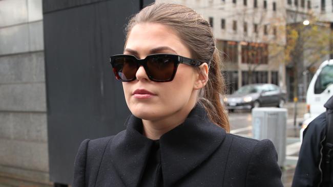 Belle Gibson arrives at the Federal Court in Melbourne, Thursday, June 20, 2019. Cancer con artist Belle Gibson is facing court over failure to pay a $410,000 penalty. (AAP Image/David Crosling) NO ARCHIVING