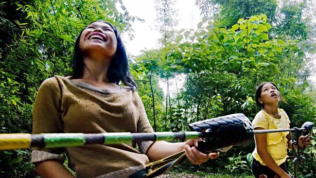 Local Hmong girls use the zip-lines to access the highest points of The Gibbon Experience tree-houses to get phone coverage so they can call their boyfriends.