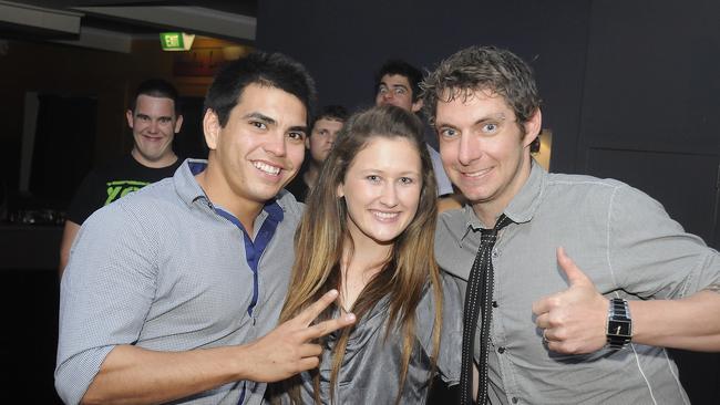 After dark – (Left) Shane Orr, Tia Toomey and Colin Beer at the Bojangles Nightclub in Gladstone. Photo Tom Huntley / The Observer