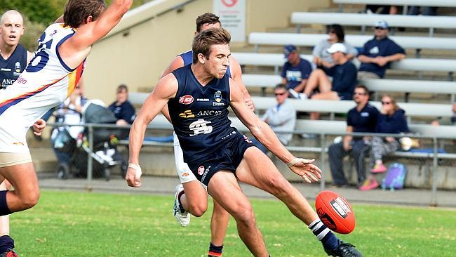 South’s Joel Cross kicks the ball against the Crows. Photo: Campbell Brodie.