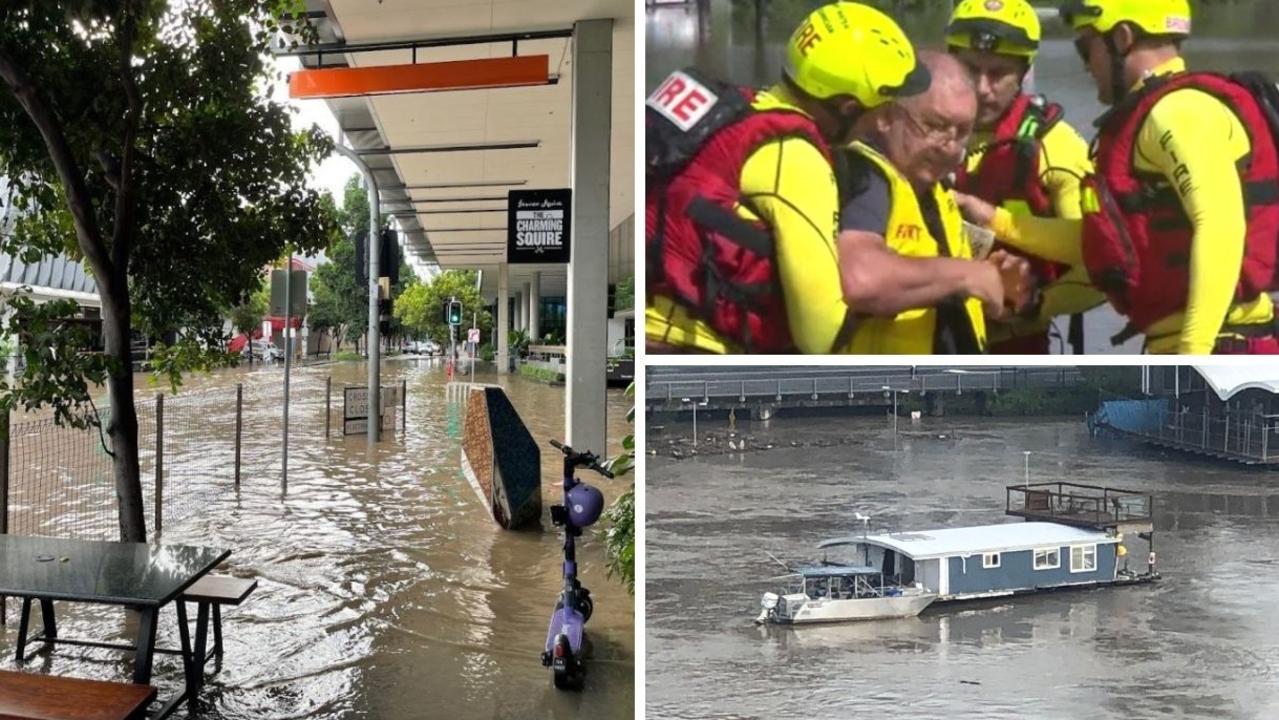 Floodwaters have filled Brisbane streets as rescues unfolded and unmanned houseboats float downstream.