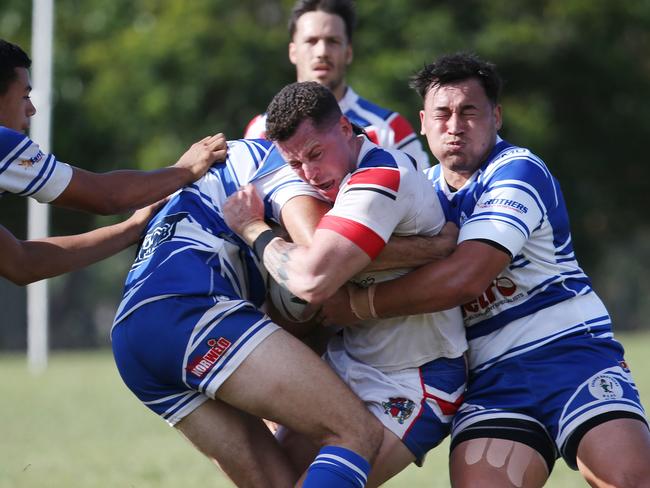 Ivanhoes' Dallas Skardon is wrapped up by the Brothers defence in the Cairns District Rugby League (CDRL) Round 16 match between the Ivanhoe Knights and Cairns Brothers, held at the Smithfield Sporting Complex. Picture: Brendan Radke