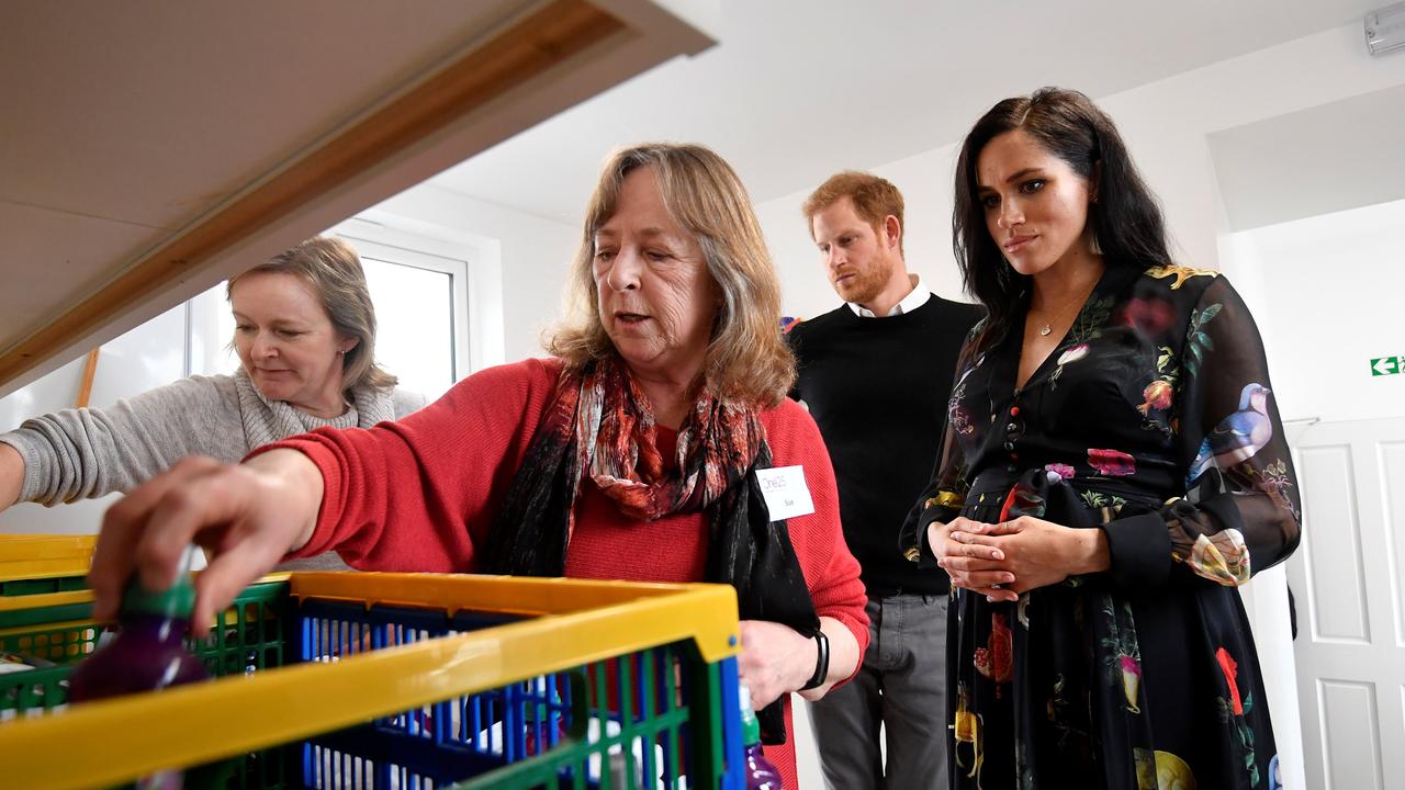 Prince Harry and Meghan during a visit to One25, a charity specialising in helping women to break free from street sex work, addiction and other life-controlling issues.