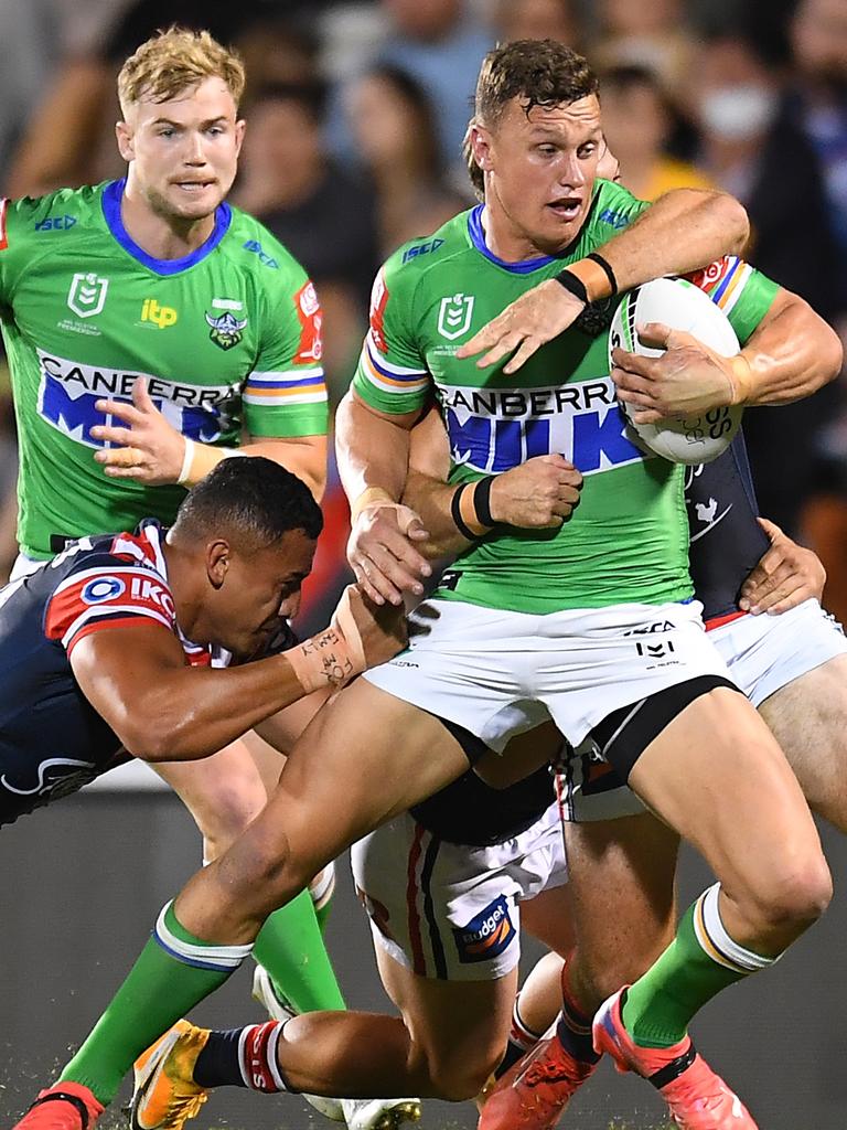 Jack Wighton of the Raiders is tackled during the round 25 NRL match between the Canberra Raiders and the Sydney Roosters at BB Print Stadium, on September 02, 2021, in Mackay, Australia. Picture: Albert Perez