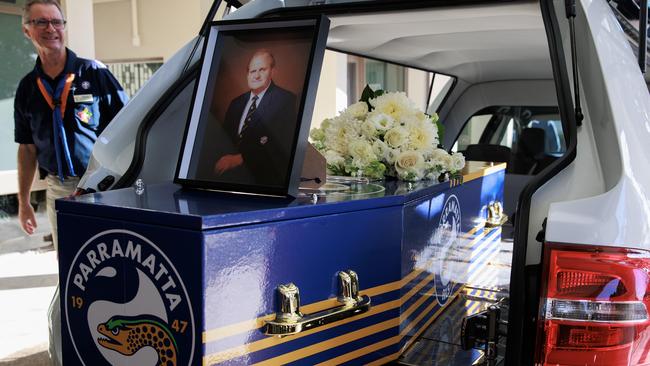 Mr Overton leaves no doubt his heart was blue and gold as his coffin arrives at Castlebrook Memorial Park, Rouse Hill on August 10. Picture: Justin Lloyd