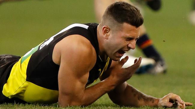 Richmond’s Jack Graham after suffering a shoulder injury on Friday night. Picture: Michael Willson/AFL Media/Getty Images)