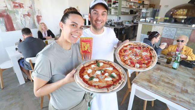 Anna Gazzola with a Rita pizza; tomato base, mozzarella and basil and Loris Perobello with a Giosa pizza; tomato base, mozzarella, fresh mushroom bresaola and parmesan at Goccia Italian. Photo by Richard Gosling