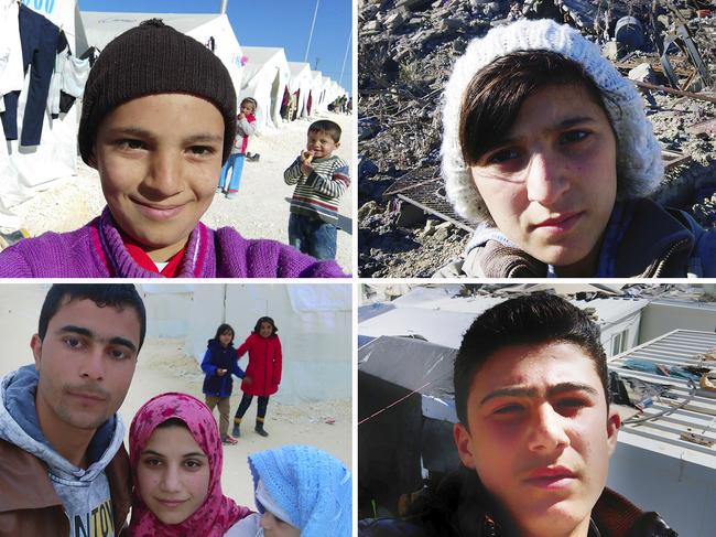 **ONE TIME WEB USE ONLY*** **CONTACT NETWORK PIC DESK FOR PRINT RIGHTS*** 22nd Feb 2015: Murat Mustafa, 10 years old, from Kobane takes a selfie. He remembers vividly the day his village was attacked by the ISIS, seeing them arriving, heavily armed. With his family, he left the house in a hurry and headed to the border of Turkey. There, they were loaded into trucks and brought to a refugee camp in Suruc. All the way he was crying, scared and worried about his house. Remembering makes him cry again. His father has gone back to see for himself and told him everything is destroyed. But, there are people returning, and the town will be built again. When given the smartphone and asked to take a selfie, a smile appears in his eyes, a light of optimism, thinking about his future return to Kobane. (Photo by Romano Cagnoni/Getty Images)