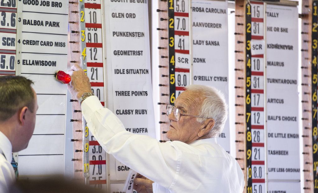 John Forde works the numbers on Melbourne Cup day at Clifford Park, Tuesday, November 7, 2017. Picture: Kevin Farmer