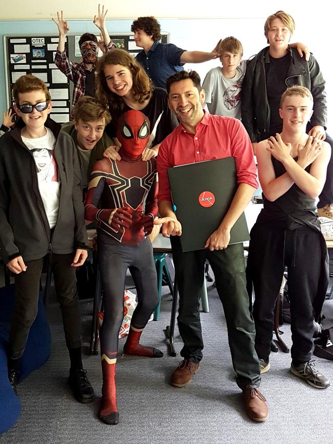 Australian Library and Information Association (ALIA) CEO Cathie Warburton said “getting kids excited by reading is more important than ever”. Comic book illustrator and artist Marcelo Baez is pictured with Mossvale High students after one of his workshops for kids. Picture: supplied