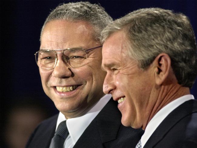 Former US Secretary of State Colin Powell with George W. Bush.