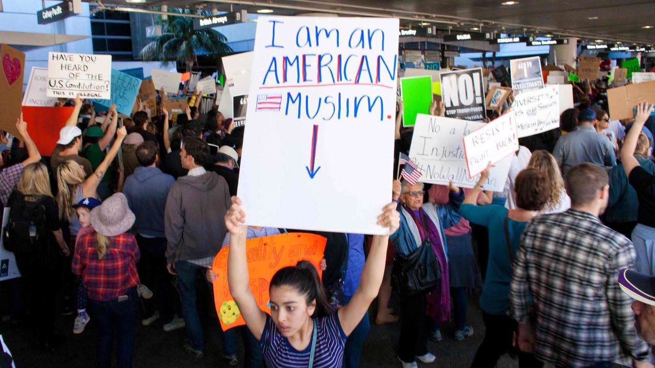 Protesters gather at the Los Angeles International Airport to demonstrate against President Trump's executive order effectively banning citizens from seven Muslim majority countries. Picture: Konrad Fiedler/AFP