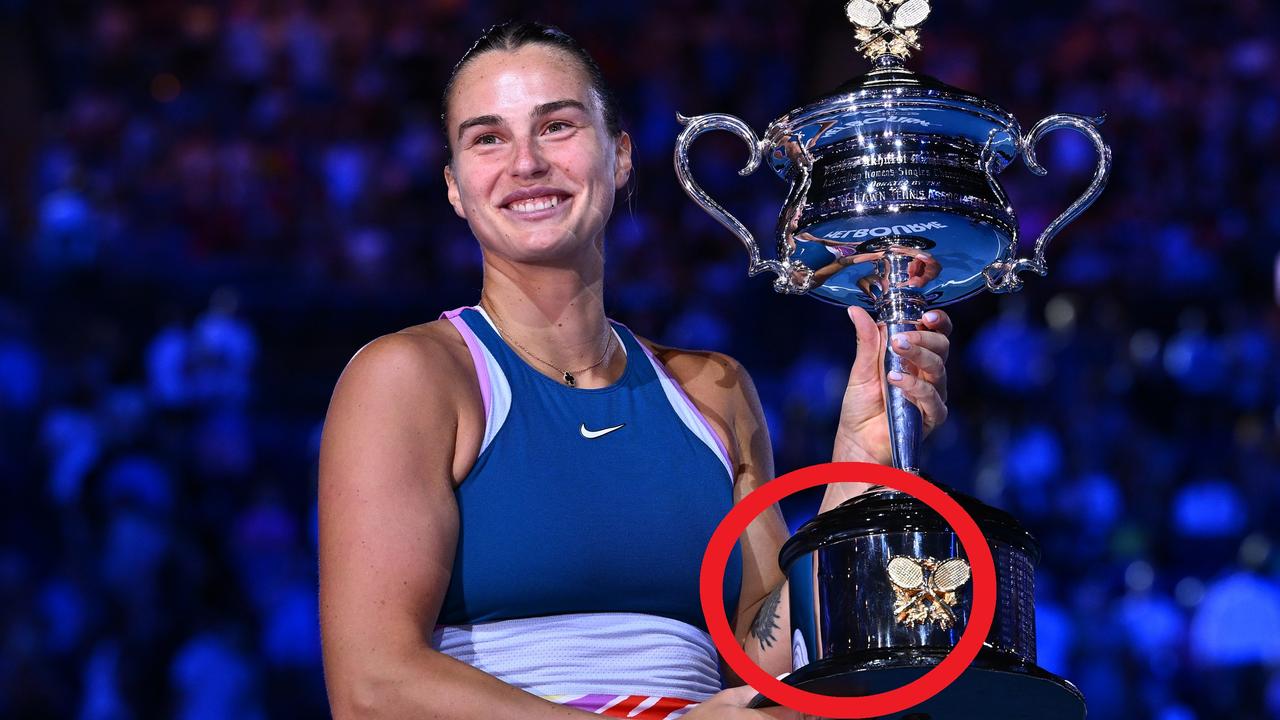 Aryna Sabalenka poses with the Daphne Akhurst Memorial Cup. Photo by Quinn Rooney/Getty Images.