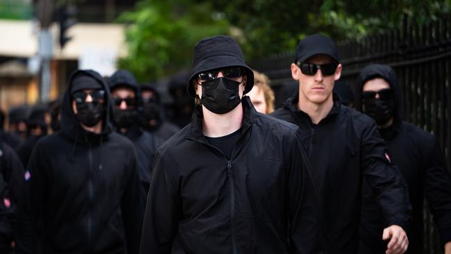 Members of the National Socialist Network were given a move on order from police at North Sydney Station on Australia Day.