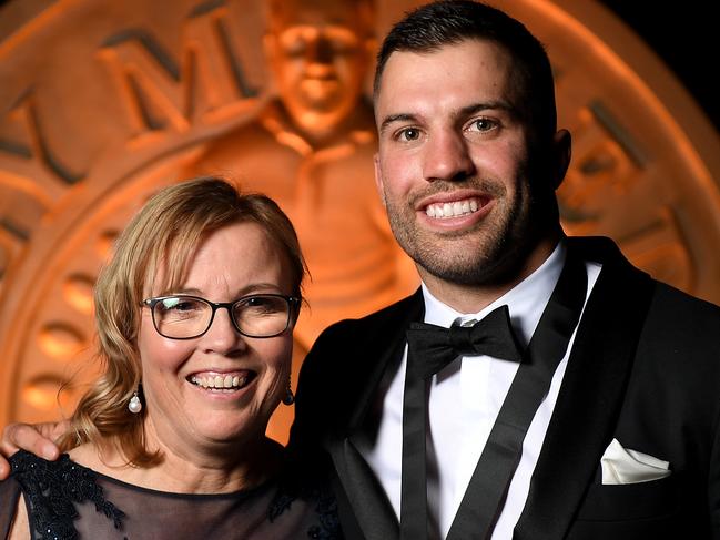 Sydney Roosters player James Tedesco poses for a photograph with his mother Rosemary after winning the Dally M Player of the Year award during the 2019 Dally M Awards at the Hordern Pavilion in Sydney, Wednesday, October 2, 2019. (AAP Image/Dan Himbrechts) NO ARCHIVING