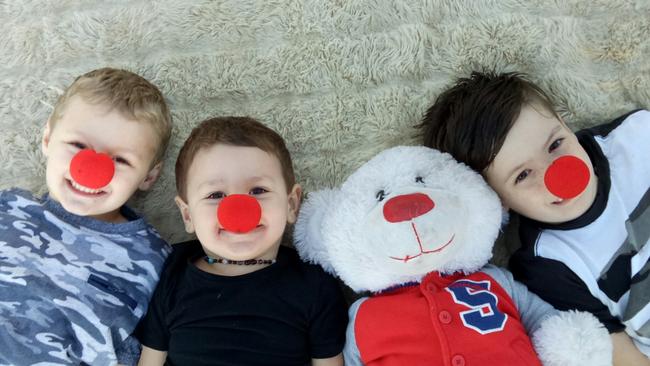 Dylan’s siblings with their ‘Dylan bear’.