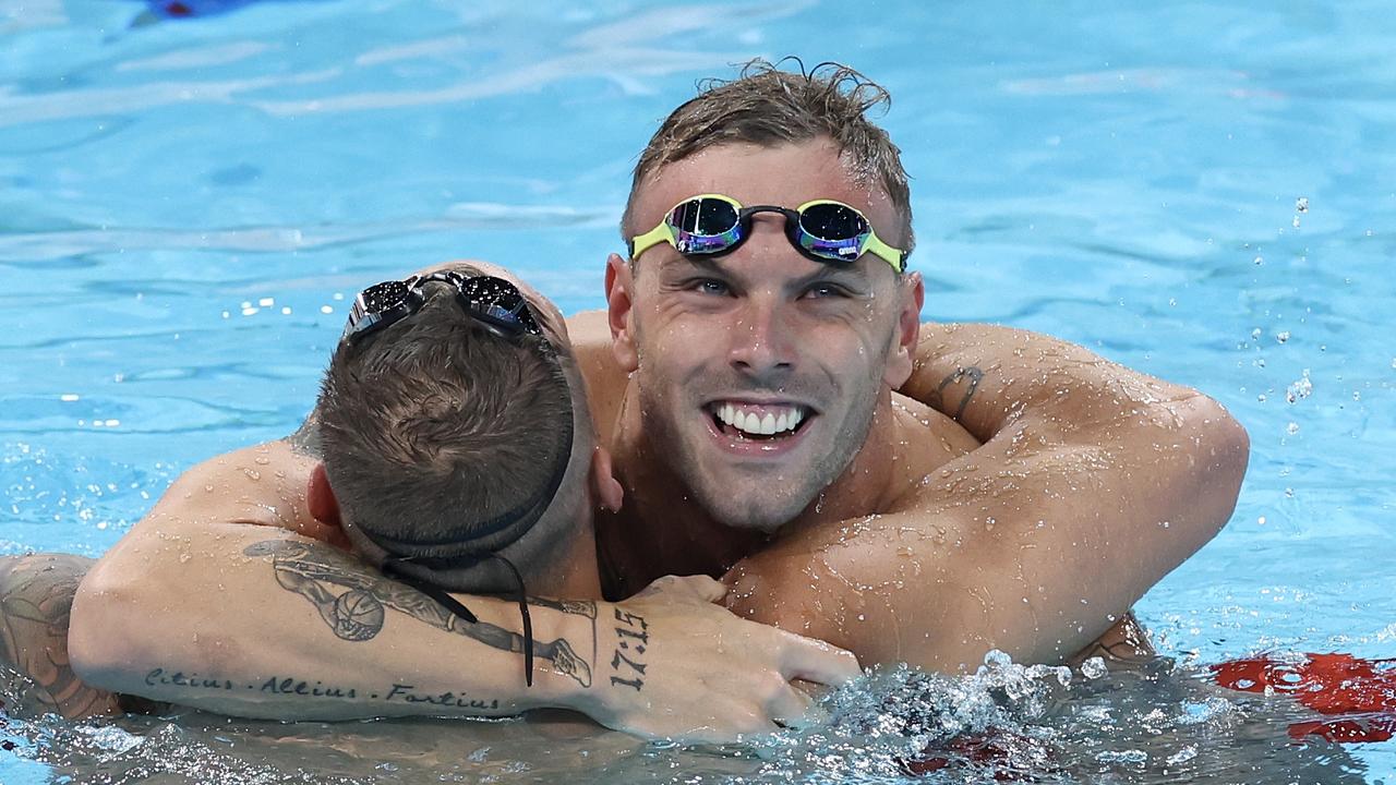 Kyle Chalmers and Caeleb Dressel embrace after the 4x100m freestyle relay. Picture: Quinn Rooney/Getty Images