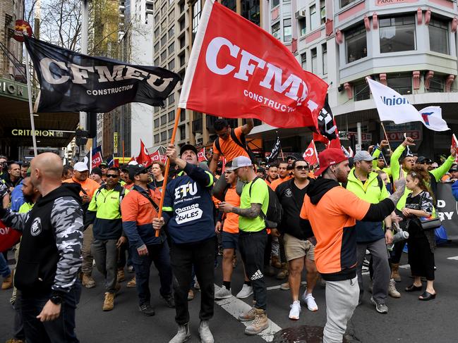 Trade and construction workers take part in a protest march in Sydney, Thursday, September 6, 2018. Thousands of workers rallied demanding the abolition of the Morrison Government's Australian Building and Construction Commission (ABCC). (AAP Image/Dan Himbrechts) NO ARCHIVING