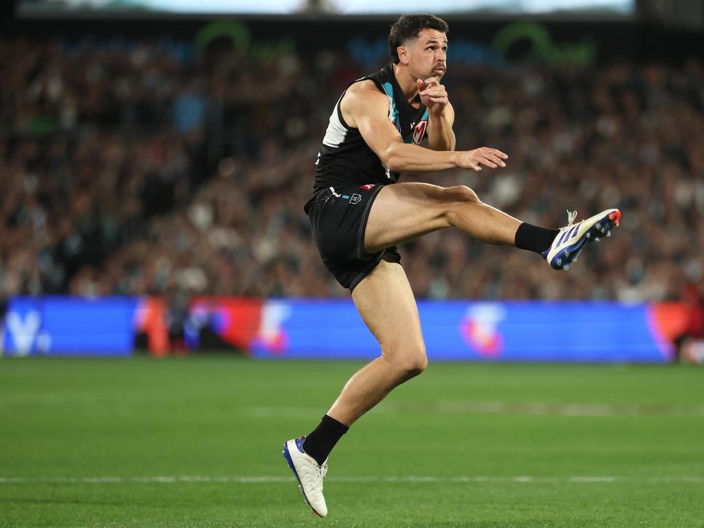 ADELAIDE, AUSTRALIA – SEPTEMBER 05: Ryan Burton of the Power kicks the ball during the 2024 AFL Second Qualifying Final match between the Port Adelaide Power and the Geelong Cats at Adelaide Oval on September 05, 2024 in Adelaide, Australia. (Photo by James Elsby/AFL Photos via Getty Images)