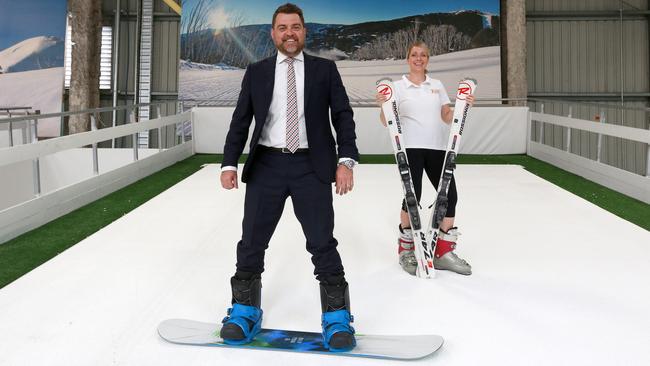 Savills’ Shaw Harrison and Urban Xtreme chief executive officer Lindsay Davis hit the slopes at the new indoor adventure centre at Hendra. Picture: AAP/Sarah Marshall