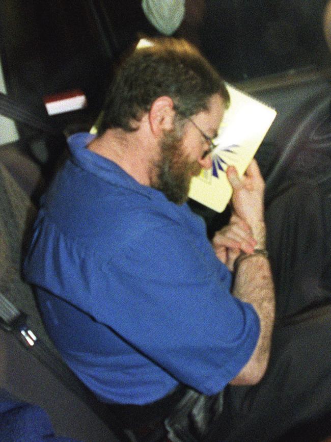 Serial killer John Justin Bunting being driven back to Yatala prison from court in 2003.