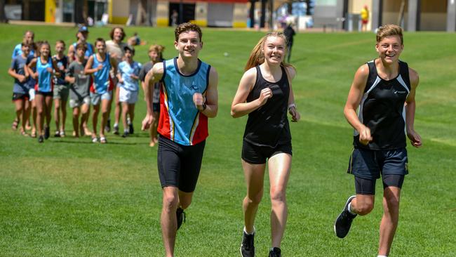 Coastal Districts Athletics Club members Aidan Konopka, Katie Woodmore and Max Disbury at Colley Reserve. Picture: AAP/Brenton Edwards