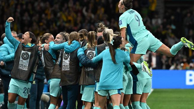 Matildas players, many of them sponsored by Nike, celebrate the team's fourth goal during the FIFA Women's World Cup against Canada. Picture: Robert Cianflone/Getty