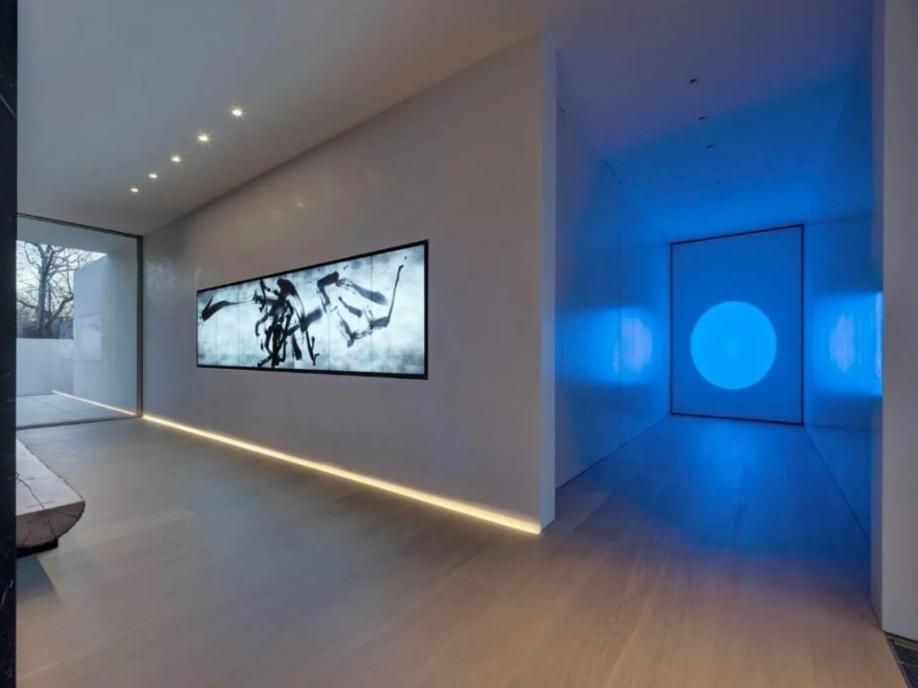 A kaleidoscopic James Turrell piece on display in the hallway. Picture: Realtor.com