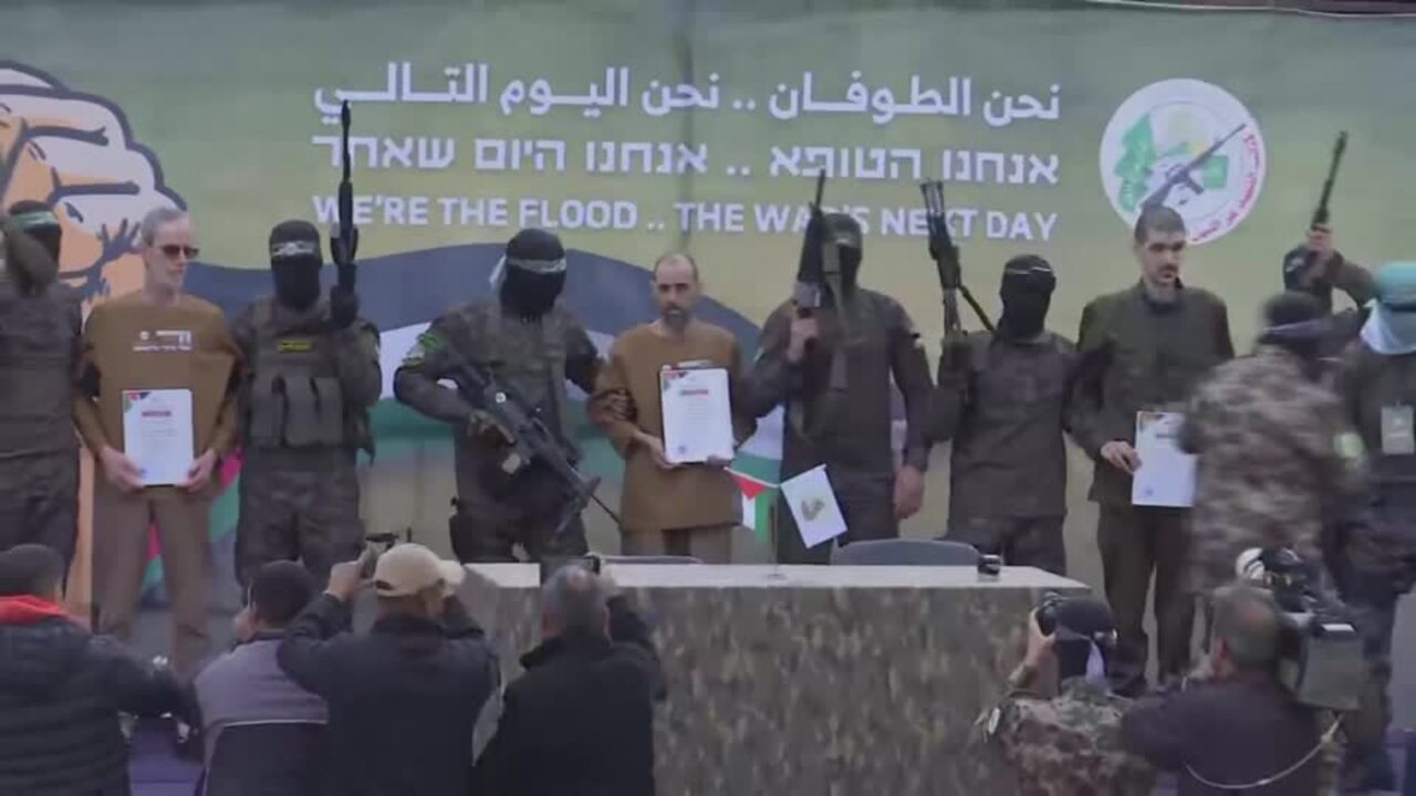 Hamas parades Israeli hostages on stage before their release