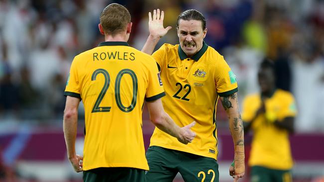 Jackson Irvine and Kye Rowles celebrate Australia’s playoff win over UAE.