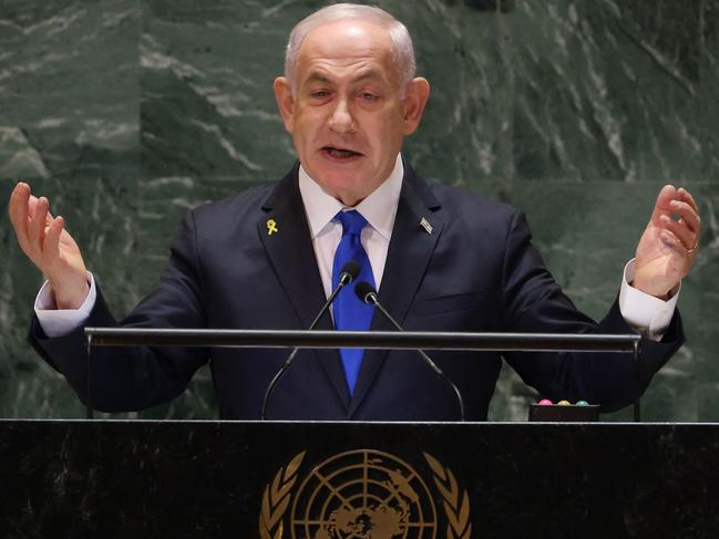 TOPSHOT - Israeli Prime Minister Benjamin Netanyahu speaks during the 79th Session of the United Nations General Assembly at the United Nations headquarters in New York City on September 27, 2024. Israeli Prime Minister Benjamin Netanyahu said at the UN Friday that operations against Hezbollah will continue, dampening hopes of a 21-day truce proposed by France and the United States this week. (Photo by Charly TRIBALLEAU / AFP)