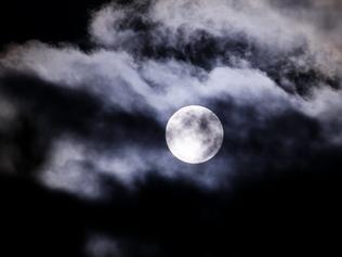 A brief parting of the clouds enabled astronomer Shevill Mathers to capture the rising supermoon.