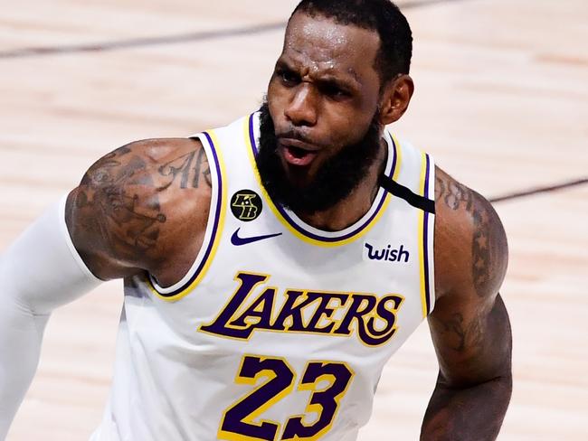 LAKE BUENA VISTA, FLORIDA - OCTOBER 11: LeBron James #23 of the Los Angeles Lakers reacts during the fourth quarter against the Miami Heat in Game Six of the 2020 NBA Finals at AdventHealth Arena at the ESPN Wide World Of Sports Complex on October 11, 2020 in Lake Buena Vista, Florida. NOTE TO USER: User expressly acknowledges and agrees that, by downloading and or using this photograph, User is consenting to the terms and conditions of the Getty Images License Agreement.  (Photo by Douglas P. DeFelice/Getty Images)