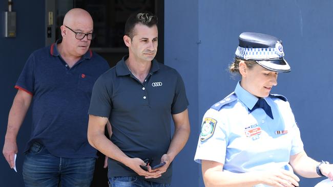 Anthony Koletti (centre), partner of Melissa Caddick and brother Adam Grimley arrive to speak to media outside Bondi Police Station. Picture: NCA NewsWire/Joel Carrett