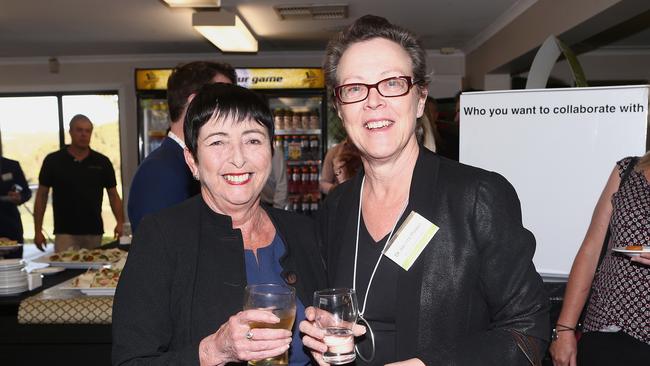 Cr Cherie Dalley and Jacinta Powell pose for a social photo at the Meadowbrook summit. Picture: AAP Image/Jono Searle