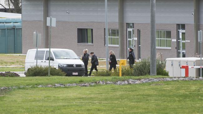 Staff walk out of the Malmsbury Youth Justice Centre. Picture: Rob Leeson