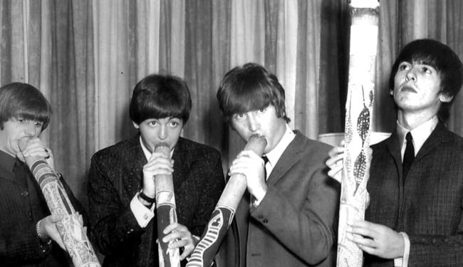File Pix Beatles Australian tour 1964 (This pic may be Sydney) - (l-R) ringo Starr, Paul McCartney, John Lennon and George Harrison playing didgeridoos - music bands groups didgeridoo Picture: File Photo