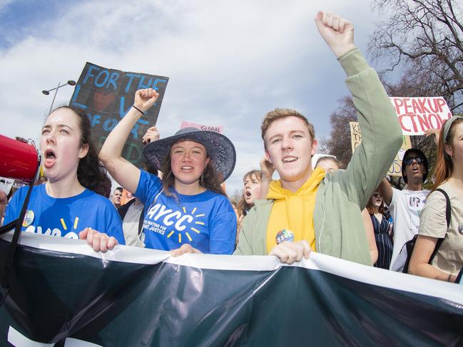 Toby Thorpe, right, on the frontline of Hobart’s 2019 climate strike rally.. Picture: RICHARD JUPE