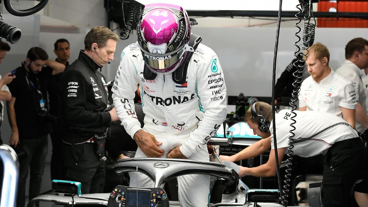 Lewis Hamilton gets into his car during testing in Spain last week.