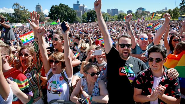 Marriage Equality supporters gather at Prince Alfred Park in Surry Hills ahead of the plebiscite announcement. Supporters react to the Yes announcement. Picture: Toby Zerna