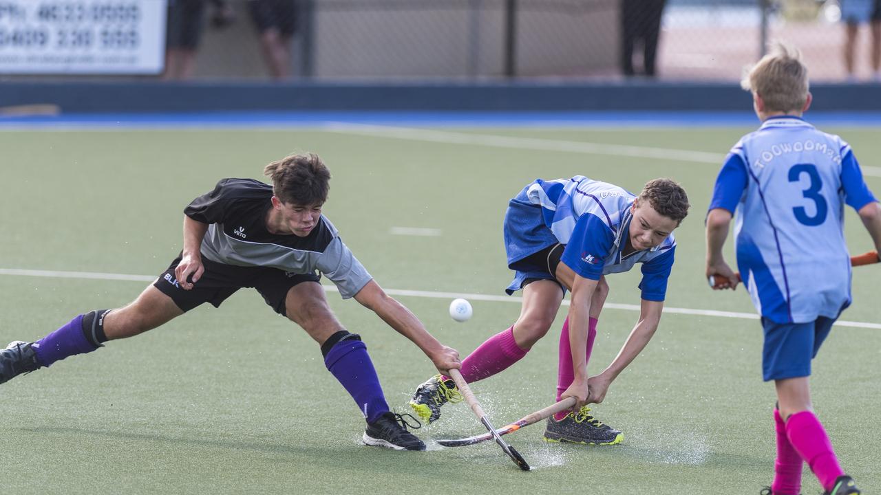 Dominic Anderson (left) of Renegades attempts to block a shot from Callum McCurley Ault of Toowoomba in Boys Div 1 final of Under 15 Invitational Tournament at Clyde Park by Toowoomba Hockey Association in 2020. Picture: Kevin Farmer