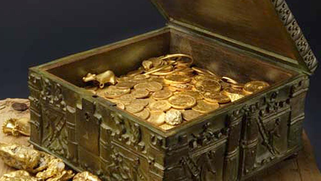 Forrest Fenn took this photo of his chest reported to contain gold dust, hundreds of rare gold coins, gold nuggets and other artifacts. Picture: AP /Addison Doty)
