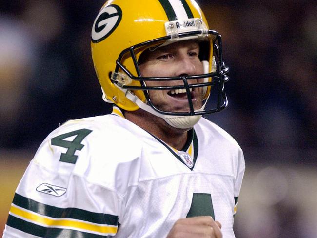 Green Bay Packers quarterback Brett Favre celebrates another touchdown pass against the Chicago Bears Sept 29 2003, in Chicago. The Packers won 38-23. (AP PicM/Spencer /Green) sport gridiron action o/seas