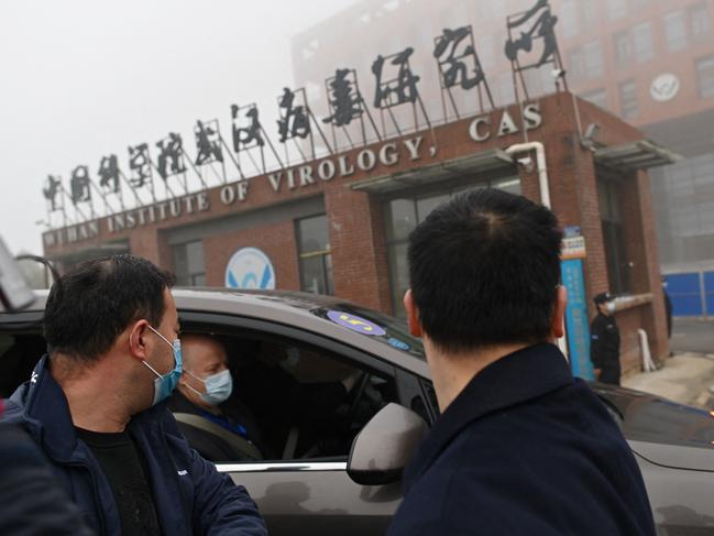 Members of the World Health Organisation pictured in Wuhan. Picture: AFP