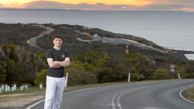 Aaron Tremul, 16, on the road at Bells Beach where he was struck from behind on his bike and almost killed. Picture: Alison Wynd